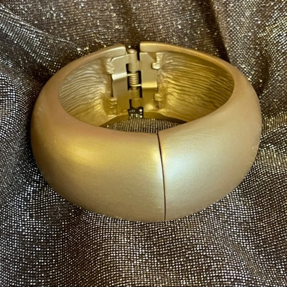 Kenneth Jay Lane satin gold bangle hinged domed